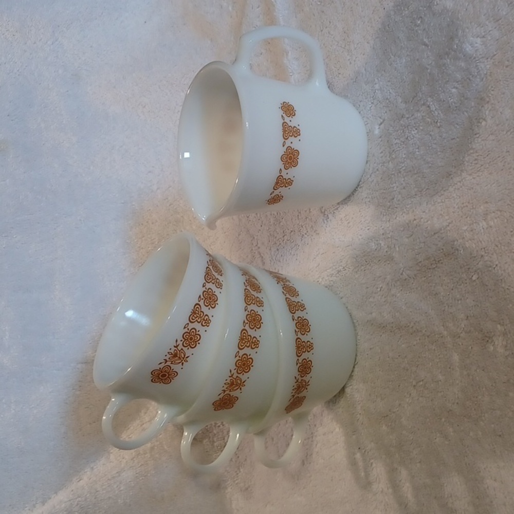 Pyrex cups and cream pitcher matches butterfly design corelle by Corning